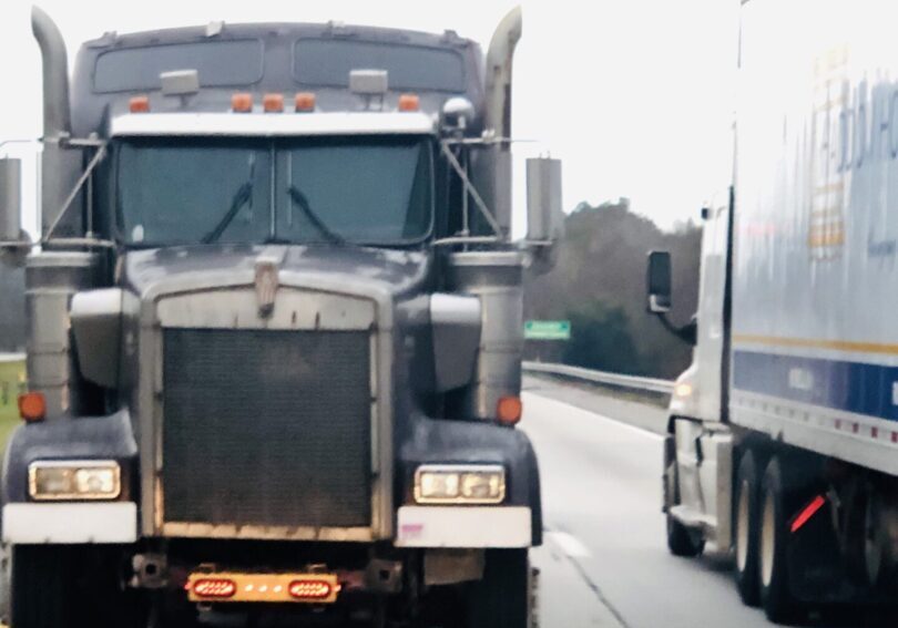 two-truck-beside-each-other-the-truck-on-the-left-2023-11-27-05-00-02-utc